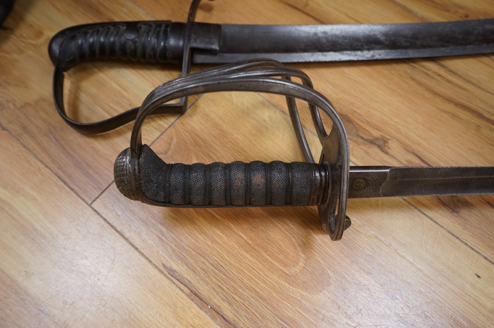 A 1796 pattern cavalry officer’s sword, blade etched J. Runkel, Solingen, regulation blade, in fair condition, grip wormed, together with an 1822 pattern sword blade, etched; Honourable Horse Artillery Company, moderatel